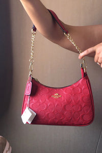 Cartera Coach