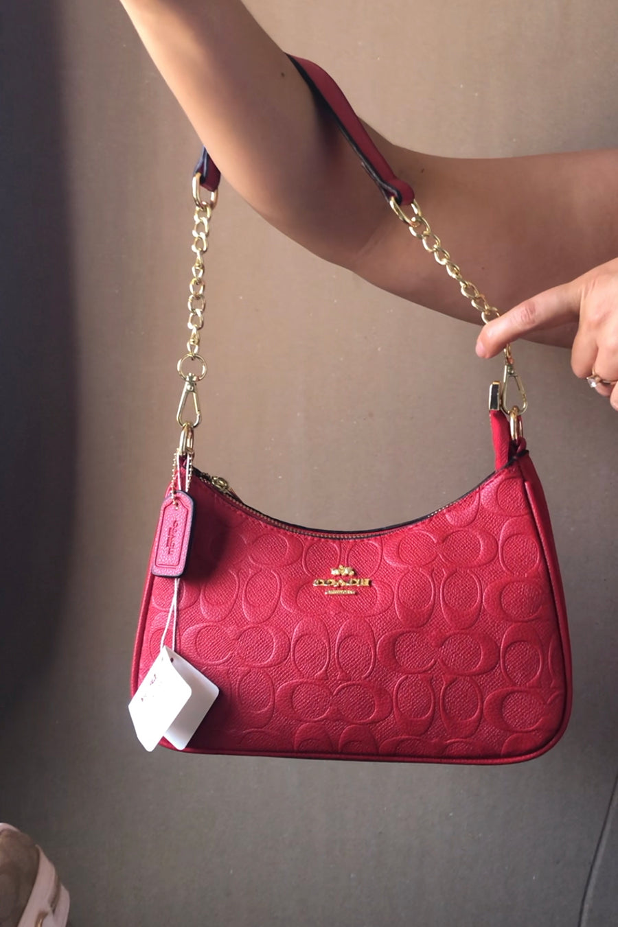 Cartera Coach